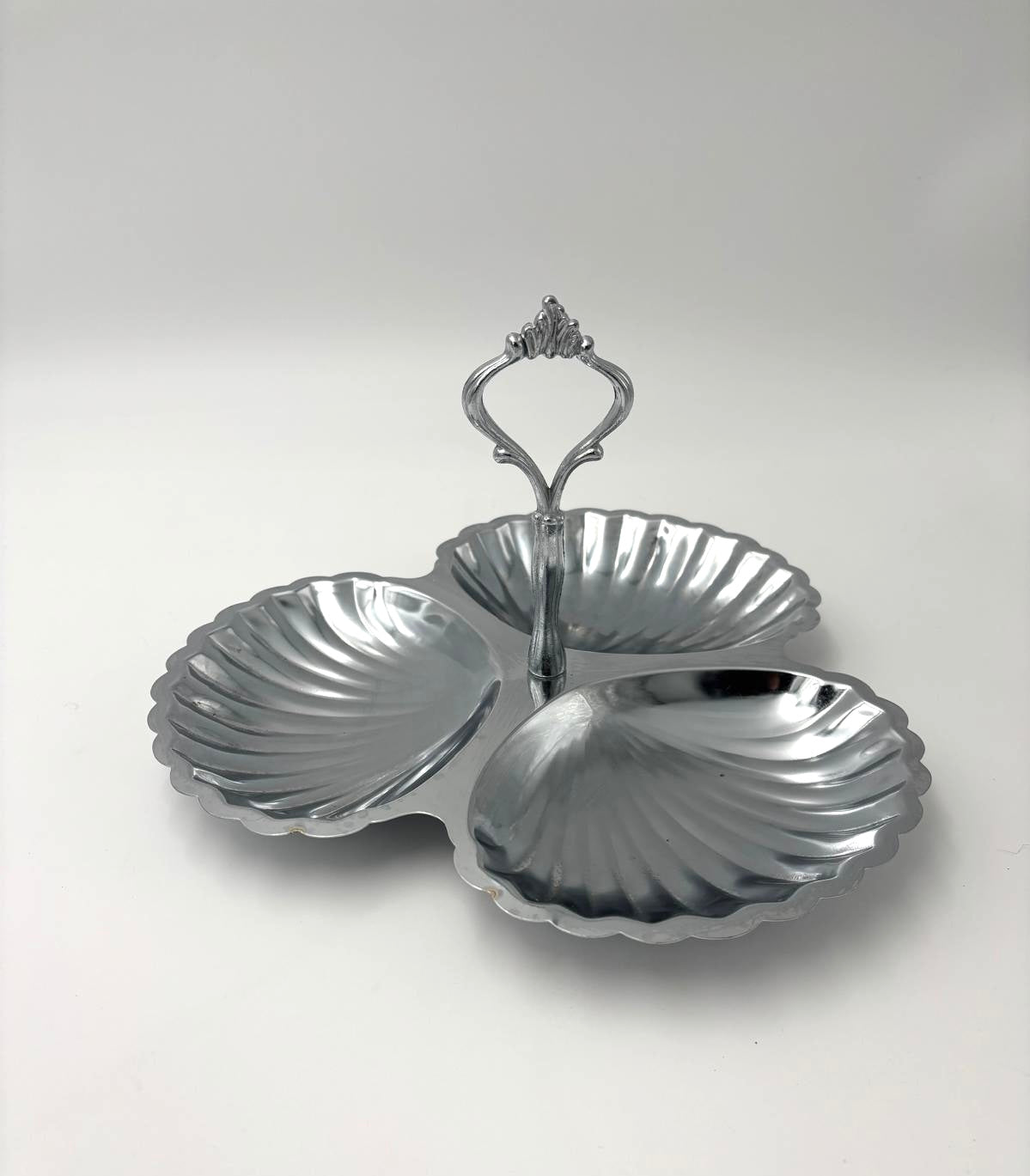 Coupelle i stål med håndtag