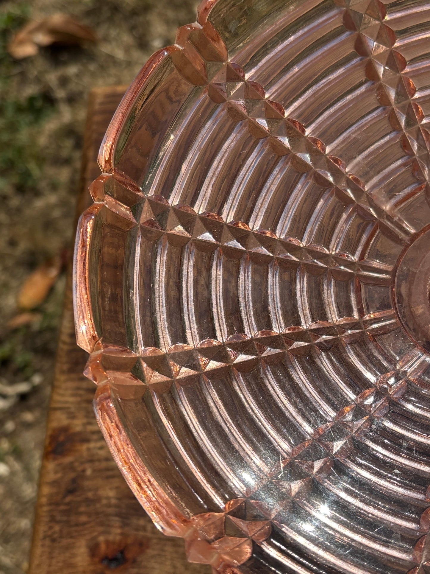 Pink glass display stand