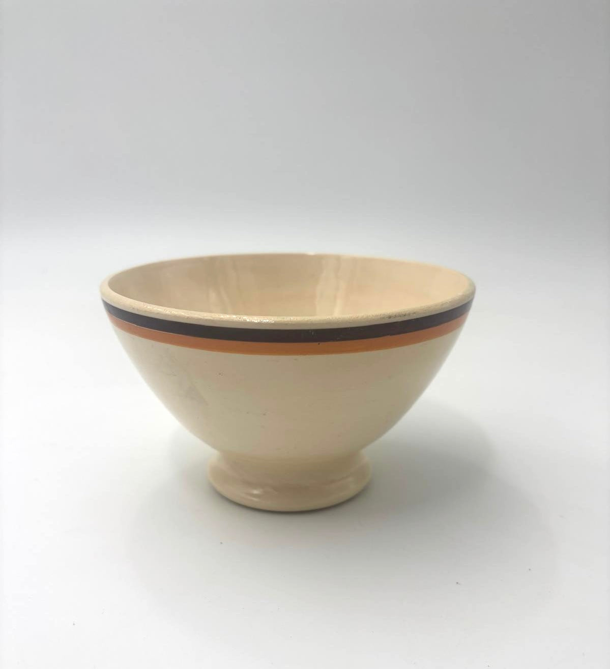 Cafe au lait skål med retrolinjer i orange og brun