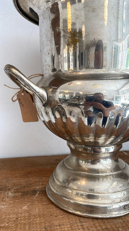 Champagne cooler shaped like a medicine bottle 