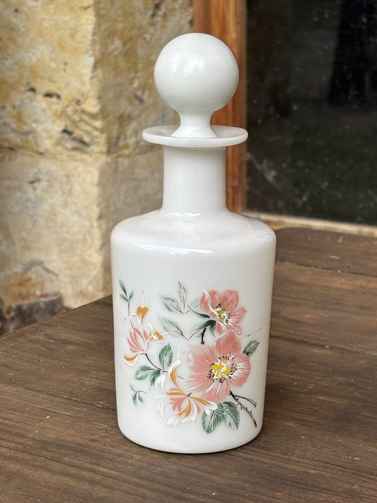 Opal glass bottle with flower motif
