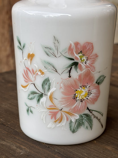 Opal glass bottle with flower motif - closeup