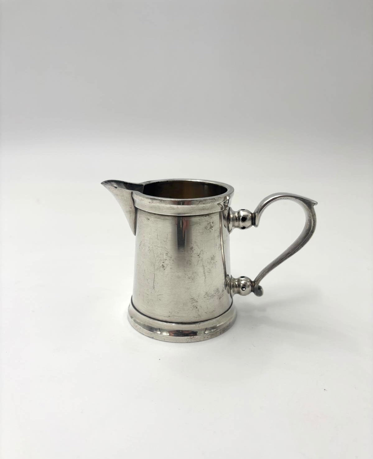 Lille flødekante i pletsølv